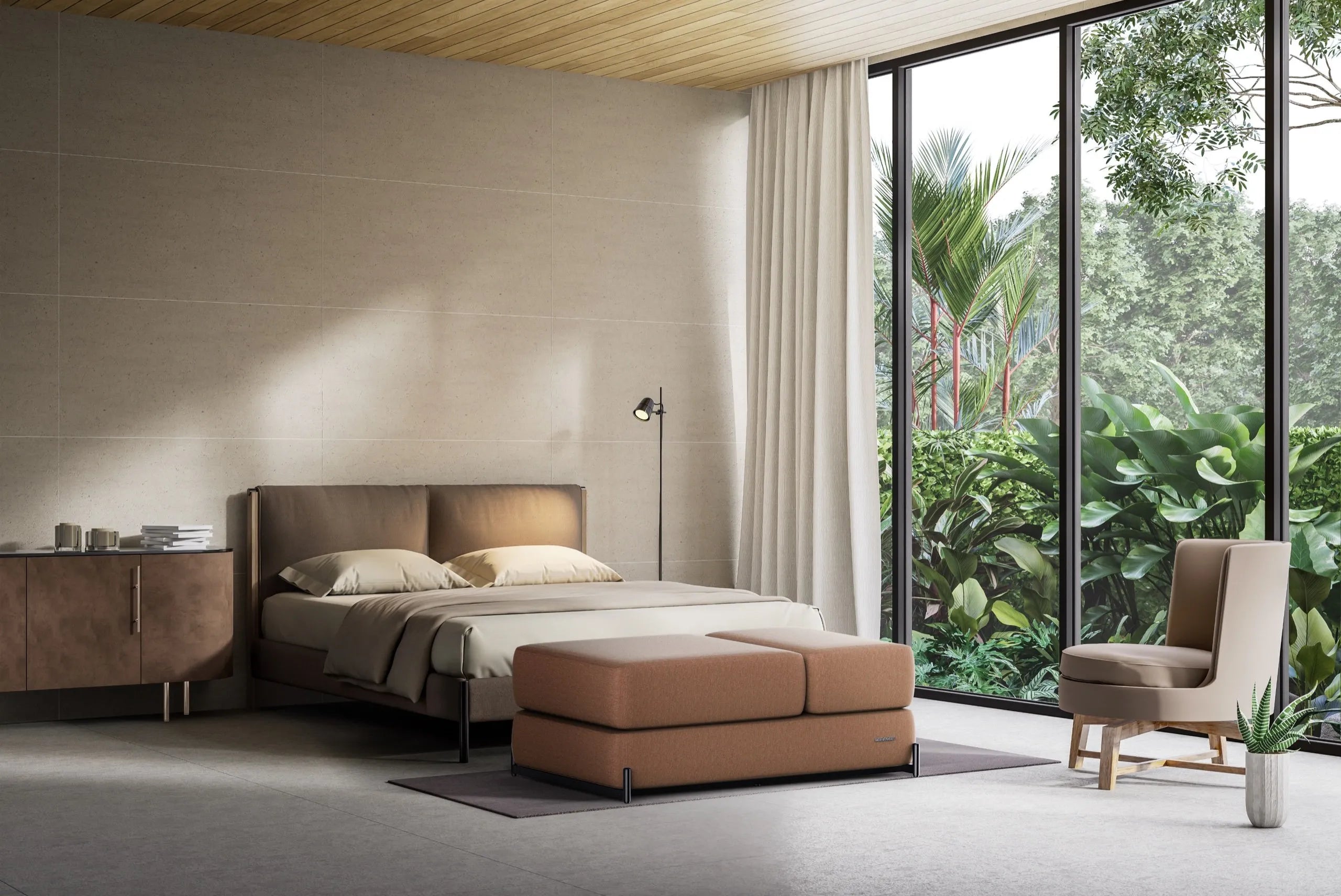 The Master S4 styled as an ottoman beside a bed in a sunlit bedroom