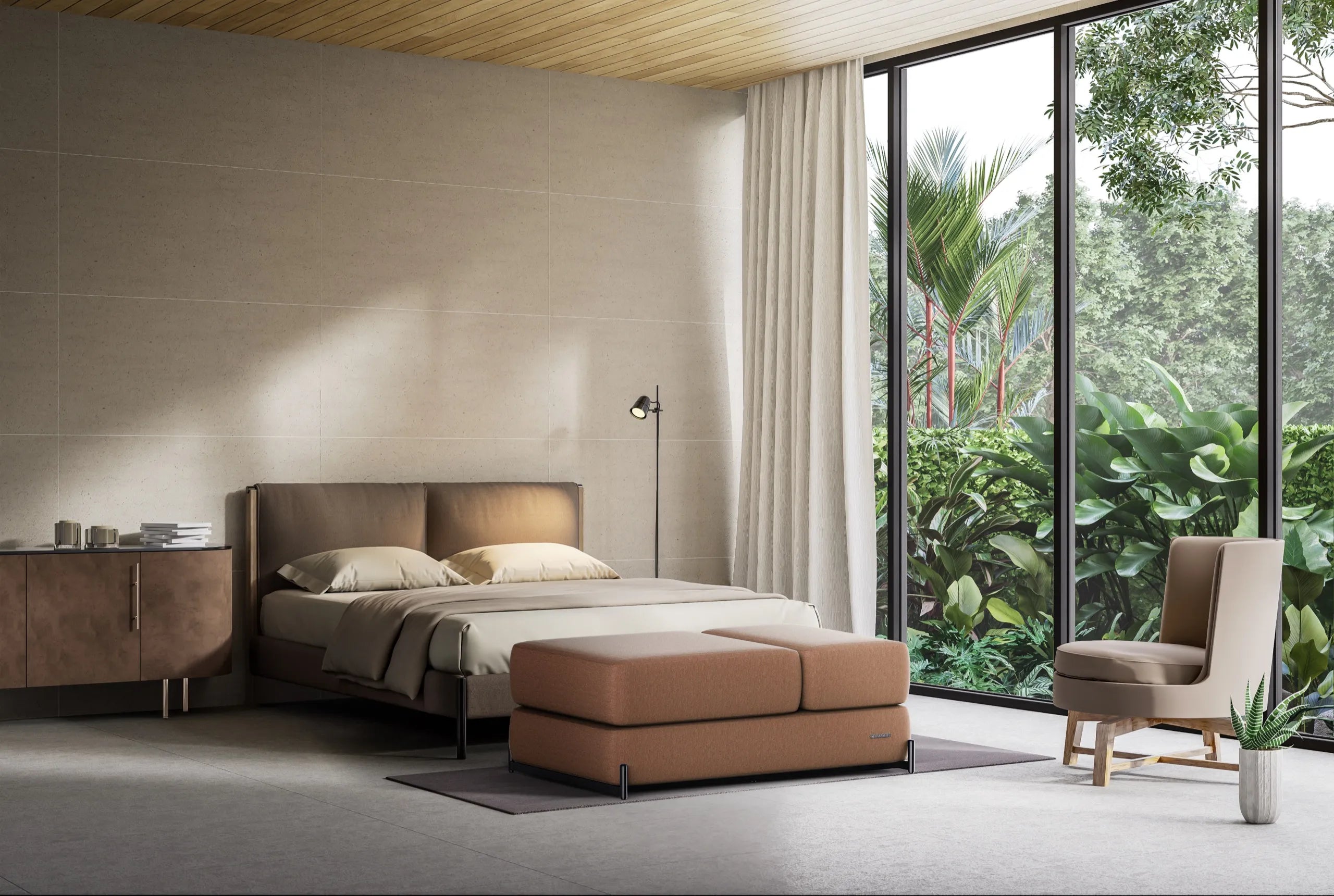 The Master S4 styled as an ottoman beside a bed in a sunlit, plant-filled bedroom