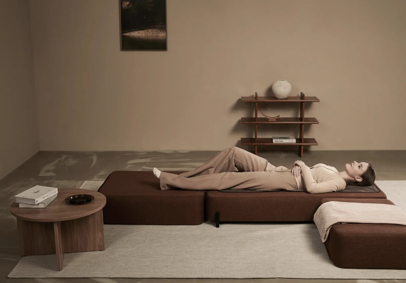 A person resting on the Master S4 in a dimly lit living room